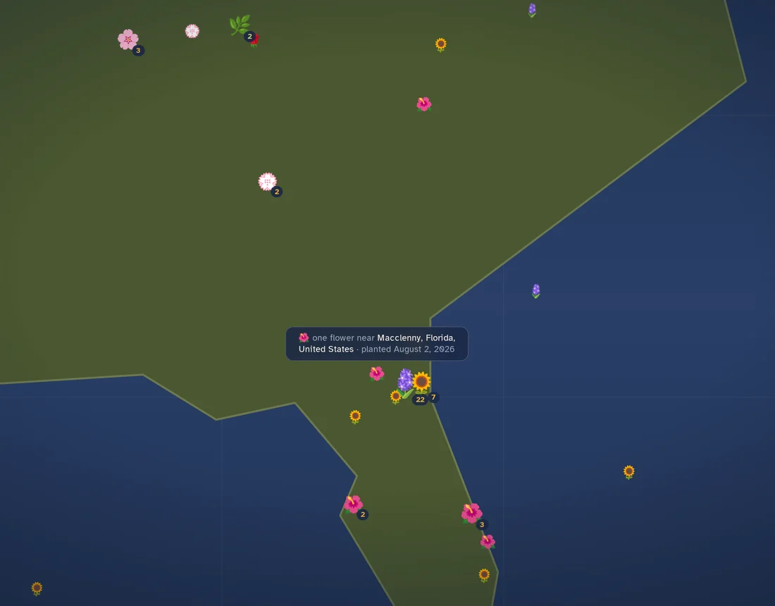 A tooltip naming the town a flower was planted in